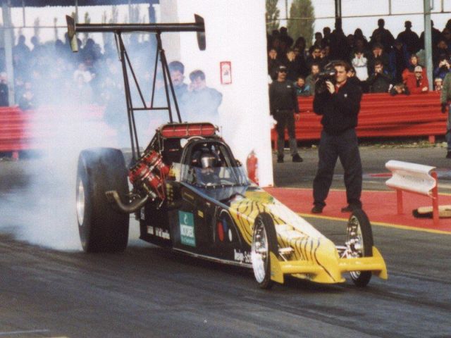 Top fuel drag racer, from
				      Wikipedia